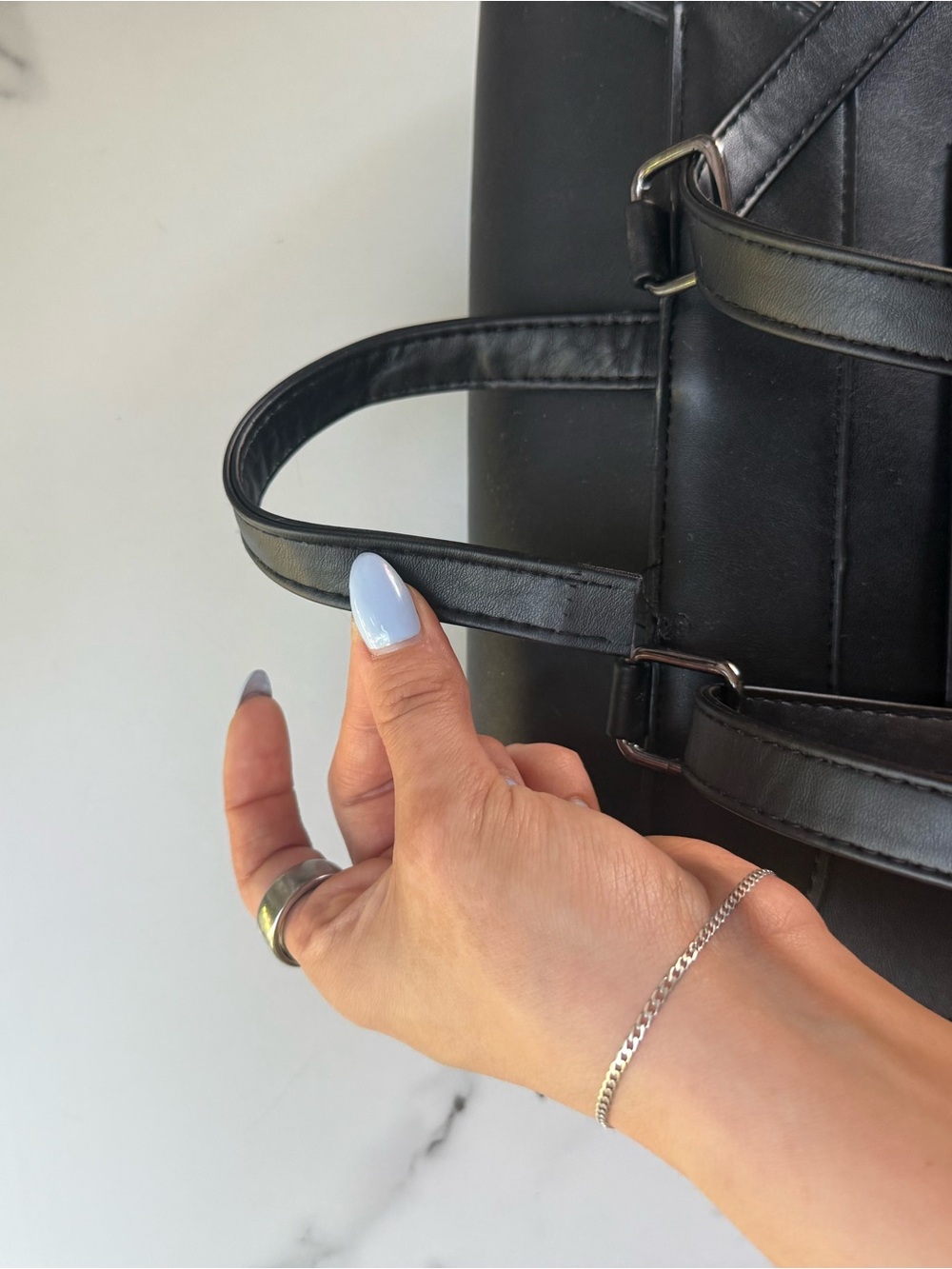 Minimalist Black Backpack with Circular Ring Detail - Picture 4 of 4